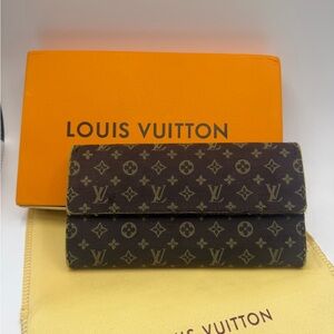 Louis Vuitton Mini Lin
denim wallet